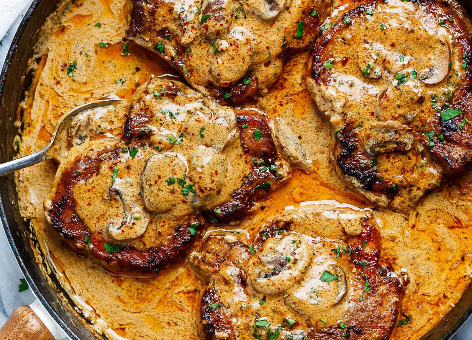 Garlic Pork Chops Recipe In Creamy Mushroom Sauce How To Cook Pork Chops Eatwell101