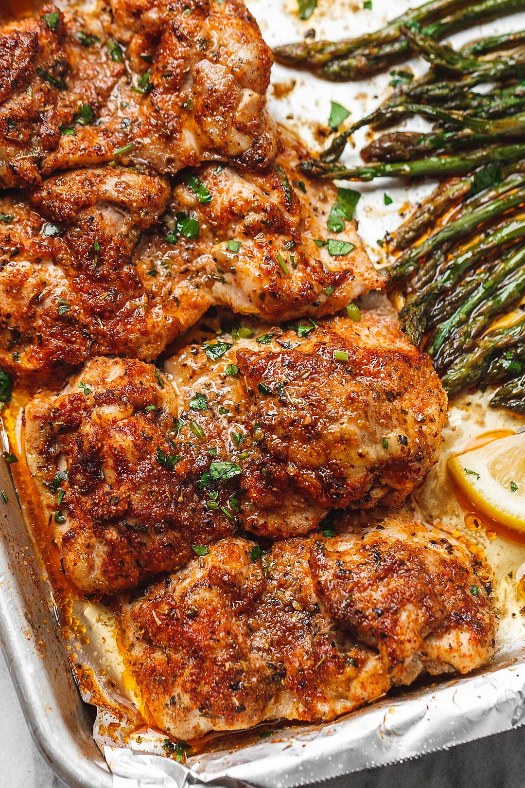 Oven Baked Chicken thighs Recipe with Asparagus — Eatwell101