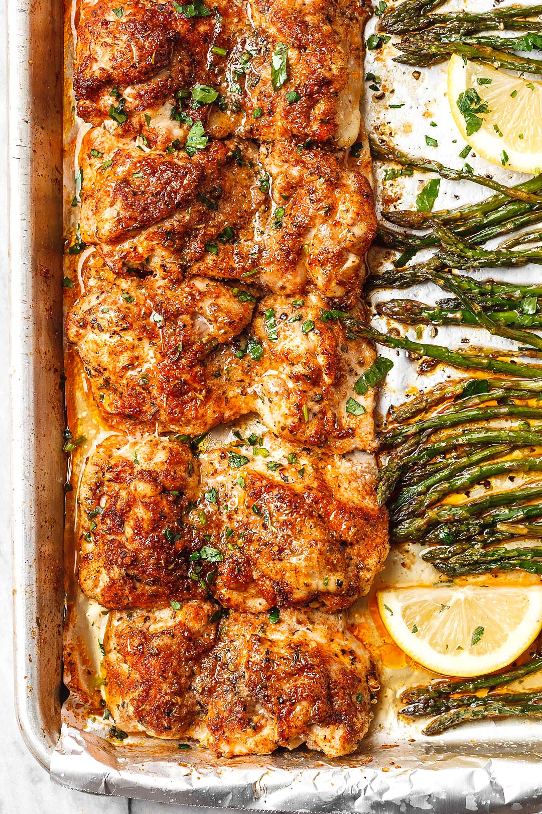 Oven Baked Chicken thighs Recipe with Asparagus — Eatwell101