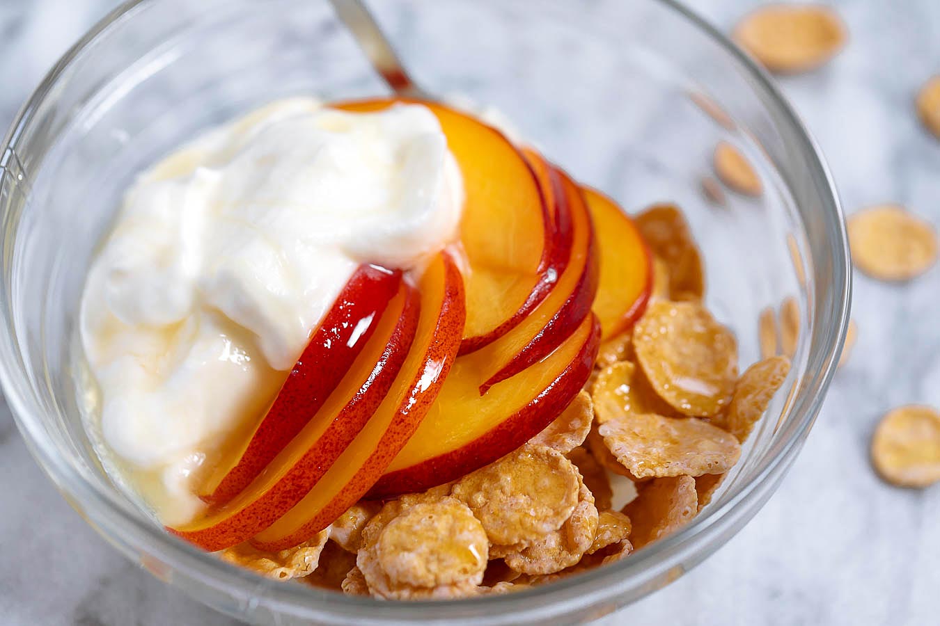Cereal Breakfast Bowl with Peach and Cream Cheese