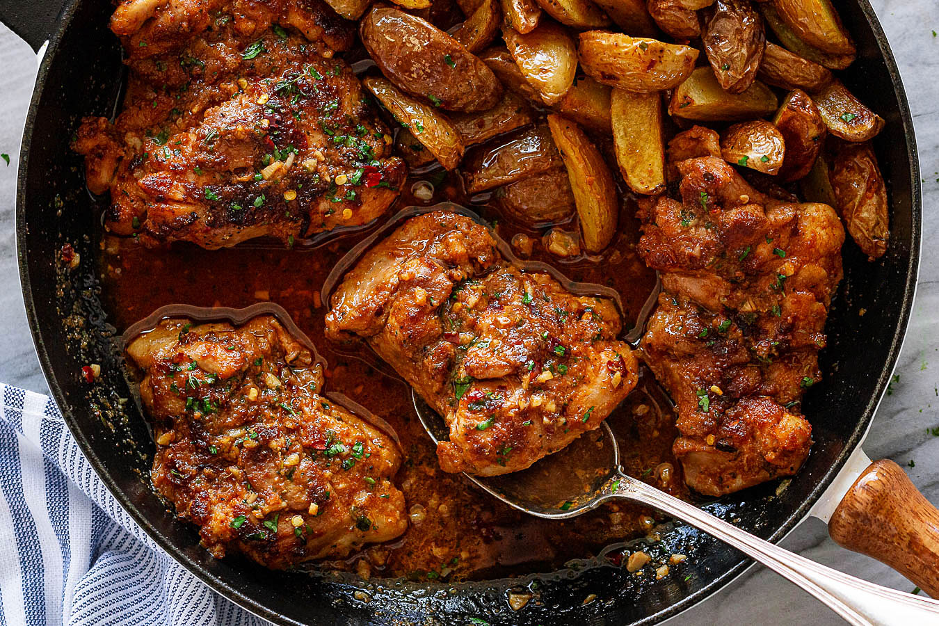 Garlic Butter Chicken Thighs with Baby Potatoes Skillet Recipe ...