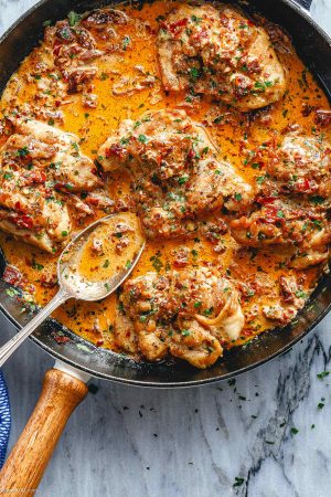 Skillet Chicken Thighs  in Sundried Tomato Parmesan Cream Sauce