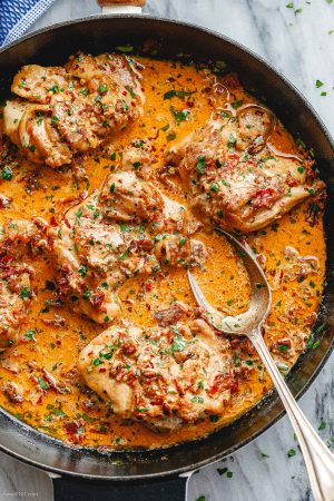Skillet Chicken Thighs  in Sundried Tomato Parmesan Cream Sauce