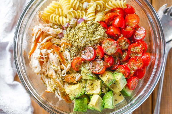 Healthy Chicken Pasta Salad with Pesto, Avocado, and Tomato