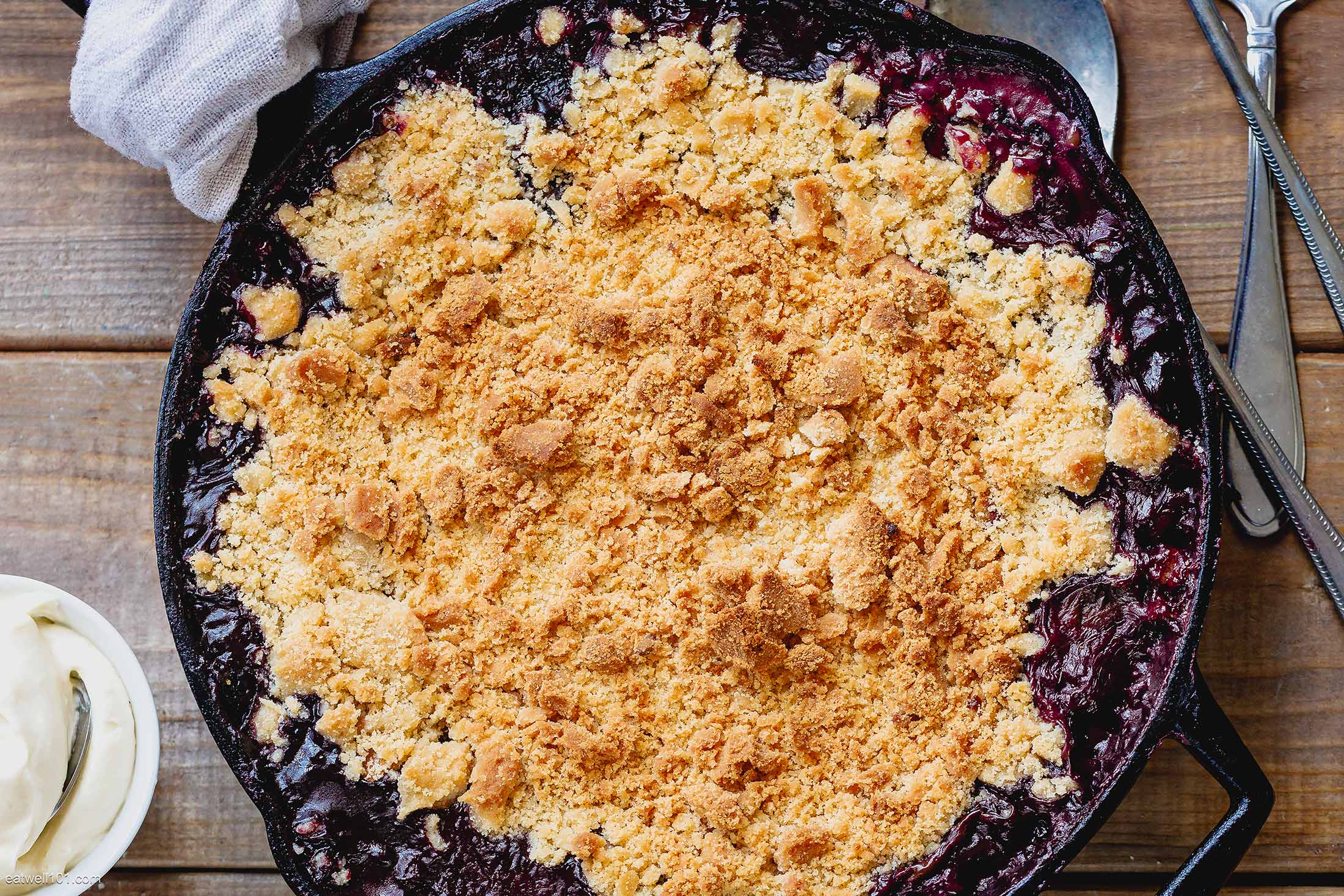 Triple Berries Skillet Cobbler with Layered Cheesecake Topping