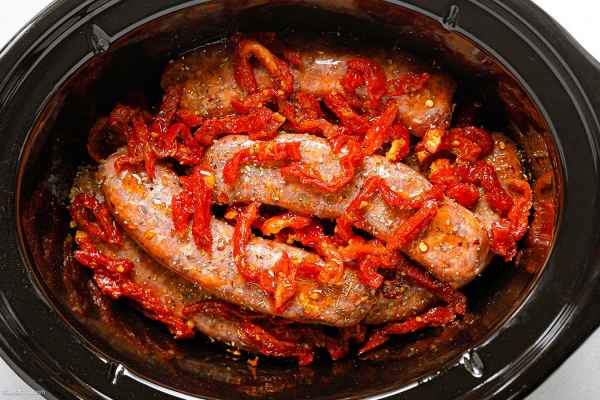 CrockPot Tuscan Sausage With Spinach and Sun-Dried Tomatoes