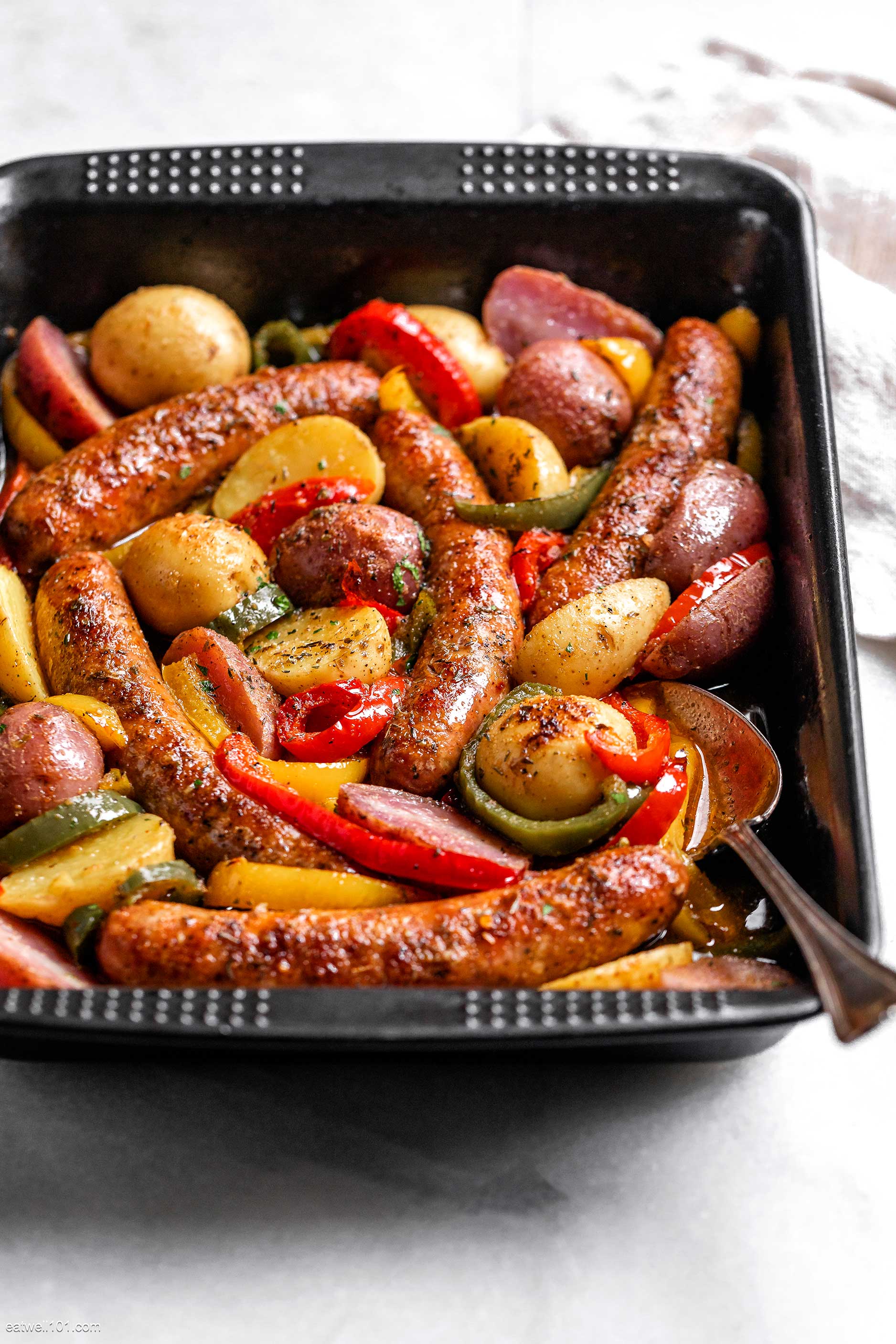 baked sheet pan sausage and peppers and potatoes recipe