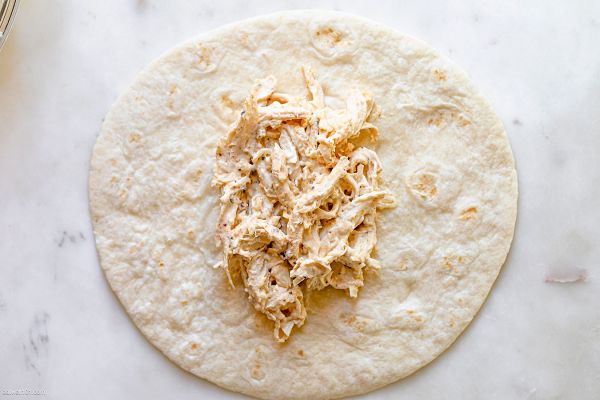Creamy White Chicken Enchiladas Casserole