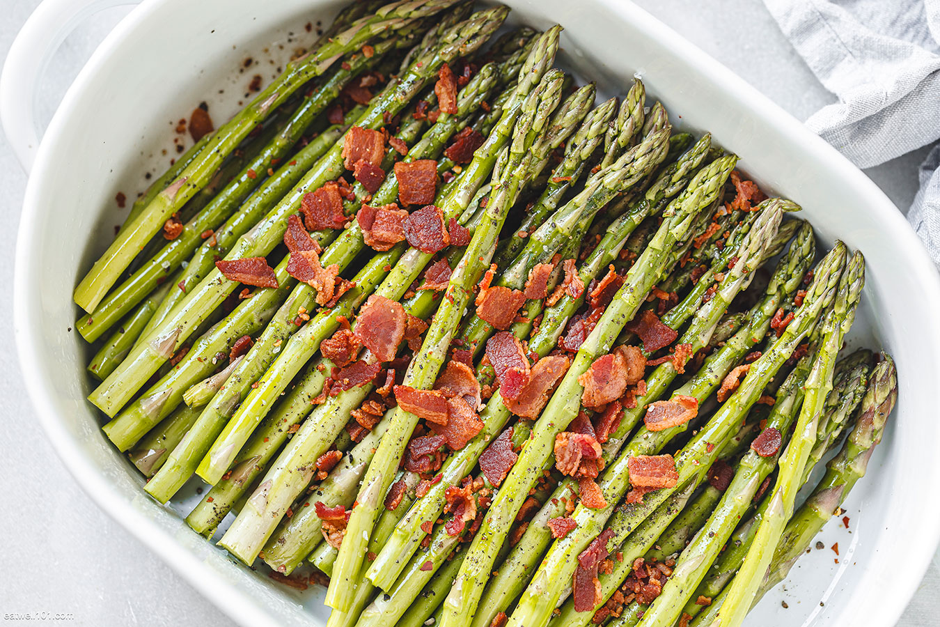asparagus and bacon in a baking dish