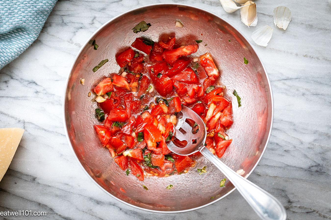 combining ingredients for the bruschetta dip