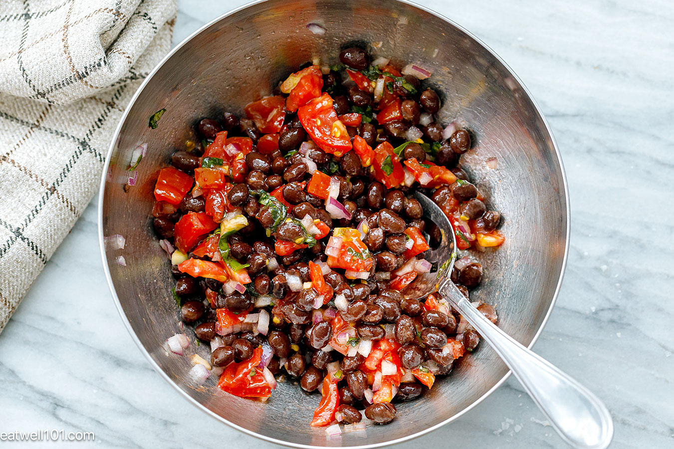 making Black Bean Dip in a bowl
