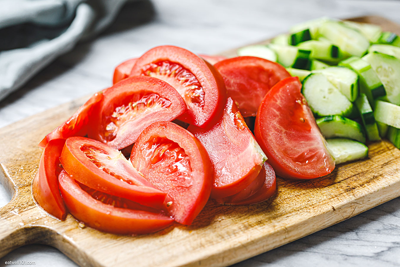 sliced tomato on a cutting board