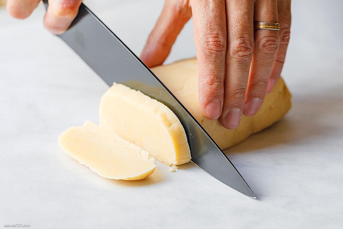 slicing shortbread cookie dough