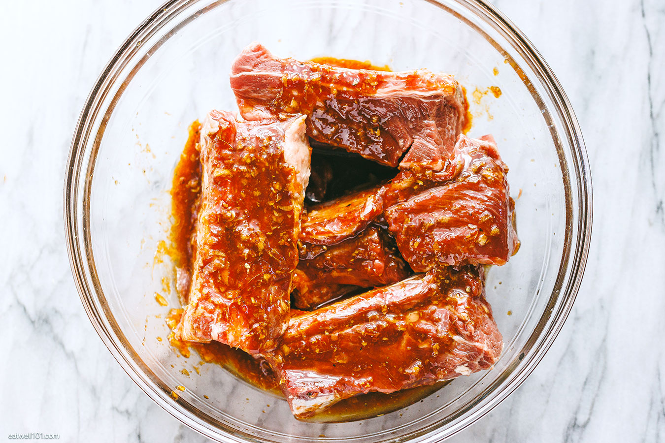 raw short ribs marinating